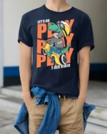 Dynamic Scooter T Rex Riding Helmet Biker Graphic Tshirt - model wearing navy tee with hands in pockets