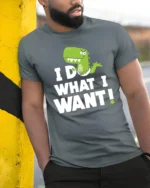 Sassy Baby T Rex I Do What I Want Diaper Graphic Tshirt - model wearing grey tee, leaning on column