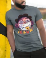 Edgy Toothy Grin Gaw Character Street Art Graphic Tshir - model wearing grey tee, leaning on column