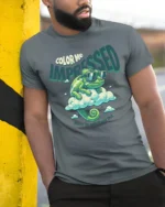 Cool Chameleon Color Me Impressed Retro Cloud Graphic Tshirt - model wearing grey tee, leaning on column