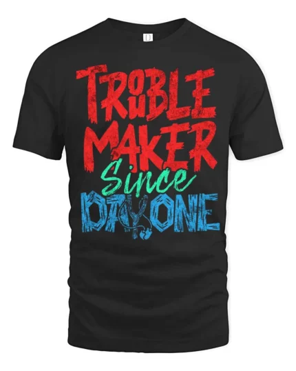 Amusing Troublemaker Since Day One Slingshot Graphic Tee - black t-shirt on white background