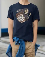Grim Reaper Coffee First Daily Routine Graphic Tee - model wearing navy tee with hands in pockets