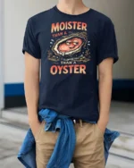 Entertaining Moister Than A Oyster Funny Seafood Graphic Tee - model wearing navy tee with hands in pockets