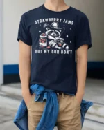Entertaining Strawberry Jams But My Gun Dont Western Tshirt - model wearing navy tee with hands in pockets