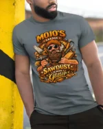 Mojo’s Garage Sawdust Is Man Glitter Soft Tshirt - model wearing grey tee, leaning on column