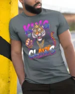 King Of Claws Tiger Crown Hip Hop Graphic Tee - model wearing grey tee, leaning on column