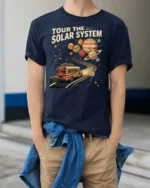 Educational Tour The Solar System Retro Bus Graphic Tee - model wearing navy tee with hands in pockets