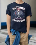 Amusing Party Hard Or Just Drop Dead Skeleton Graphic Tee - model wearing navy tee with hands in pockets