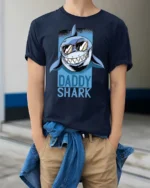 Catchy Daddy Shark Sunglasses Ocean Predator Graphic Tee - model wearing navy tee with hands in pockets