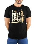 Awesome Retro Spaceship Planet Orbit Cosmic Soft Tshirt - model wearing black tee with hands behind back