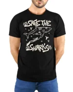 Save The Sharks Ocean Diver Protection Graphic Tee - model wearing black tee with hands behind back