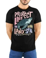 Protect Life On Both Land Sea Turtle Graphic Tee - model wearing black tee with hands behind back