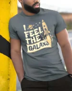 Awesome Retro Spaceship Planet Orbit Cosmic Soft Tshirt - model wearing grey tee, leaning on column