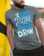 I Can’t Think Of Anything To Draw Graphic Tee - model wearing grey tee, leaning on column