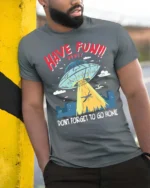 Entertaining Have Fun Honey Dont Forget To Go Home Tshirt - model wearing grey tee, leaning on column