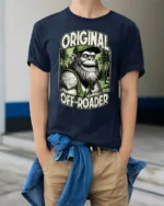 Funny Bigfoot Original Off Roader Trucker Hat Graphic Tee - model wearing navy tee with hands in pockets