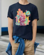 Colorful Pop Art Geometric Monkey Banana Dream Graphic Tee - model wearing navy tee with hands in pockets
