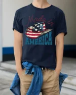 Country Pride Made In America Cowboy Hat Patriotic Graphic Tee - model wearing navy tee with hands in pockets
