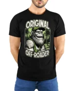 Funny Bigfoot Original Off Roader Trucker Hat Graphic Tee - model wearing black tee with hands behind back