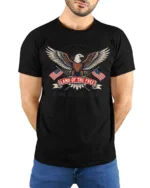 Proud Home Of The Brave United States National Slogan Tee - model wearing black tee with hands behind back