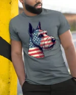 Beautiful Patriotic Schnauzer Dog USA Flag Graphic Tee - model wearing grey tee, leaning on column
