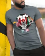 United North America Soccer Tournament Trio Animal Graphic Tee - model wearing grey tee, leaning on column
