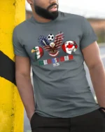 Unified North America Soccer Championship Animals Graphic Tee - model wearing grey tee, leaning on column