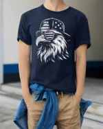 Monochrome Cool Eagle Backward Cap Patriotic Graphic Tshirt - model wearing navy tee with hands in pockets