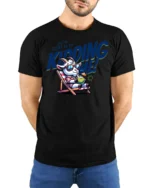 Amusing You have Goat To Be Kidding Me Vacation Graphic Tee - model wearing black tee with hands behind back