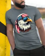 Classic United States Heritage Hunter Shades Graphic Tshirt - model wearing grey tee, leaning on column