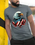 Patriot Freedom Eagle American Flag Banner Graphic Tshirt - model wearing grey tee, leaning on column