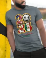 Tri Country Football Championship Emblem Multi Host Graphic Tee - model wearing grey tee, leaning on column