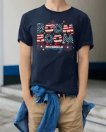 Festive Fourth Of July Boom Boom Baby Fireworks Graphic Tee - model wearing navy tee with hands in pockets