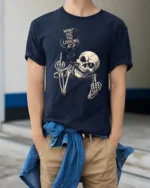 Aggressive Middle Finger Smoking Skeleton Graphic Tee - model wearing navy tee with hands in pockets