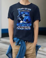 Blue Grumpy Old Man Skeleton Poker Player Graphic Tee - model wearing navy tee with hands in pockets