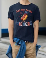 Entertaining Just Here For The Wieners Hot Dog Graphic Tee - model wearing navy tee with hands in pockets