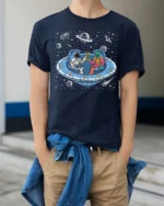 Awesome Extraterrestrial Spaceman Cheers Drinking Tshirt - model wearing navy tee with hands in pockets