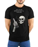 Sarcastic Good Luck Whatever Skeleton Drinking Graphic Tee - model wearing black tee with hands behind back