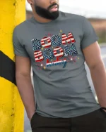 Festive Fourth Of July Boom Boom Baby Fireworks Graphic Tee - model wearing grey tee, leaning on column