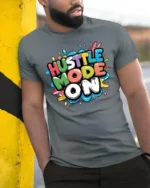Dynamic Hustle Mode On Colorful Bubble Lettering Graphic Tee - model wearing grey tee, leaning on column
