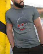 Gothic Gallows Hanging Skull Red Cross Eyes Novelty Tshirt - model wearing grey tee, leaning on column