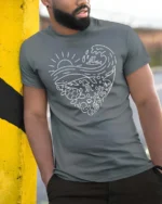 Heart Shaped Marine Life Sea Conservation Graphic Tee - model wearing grey tee, leaning on column