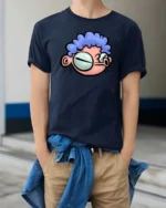 Quirky Big Eyed Blue Curly Hair Cartoon Character Graphic Tee - model wearing navy tee with hands in pockets