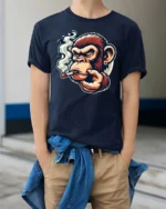 Smoking Chimp Cigar Grinder Mascot Graphic Tee - model wearing navy tee with hands in pockets