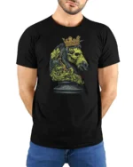 Rebellious Gilded Crown Chessboard Match Graphic T shirt - model wearing black tee with hands behind back