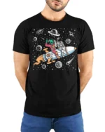 Playful Interstellar Rocket Rider Alien Spaceman Tshirt - model wearing black tee with hands behind back