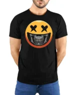 Striking Yellow Smiley Face Skull Mask Graphic Tee - model wearing black tee with hands behind back