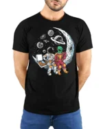 Captivating Astronaut Alien Moon Pizza Box Graphic Tee - model wearing black tee with hands behind back