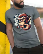 Smoking Chimp Cigar Grinder Mascot Graphic Tee - model wearing grey tee, leaning on column