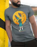 Creative Street Art Boy Painting Yellow Smiley Face Graphic Tee - model wearing grey tee, leaning on column